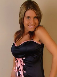 Busty Megan cant keep her top on so gets naked for the camera